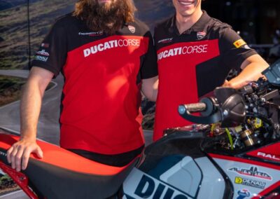 Portrait of Ducati North America riders Alexander Smith and Steve Kamrad in racing gear, ready to compete in the Mexican 1000.