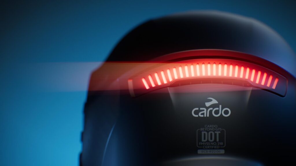 Rear view of the Cardo BEYOND GTS helmet demonstrating the integrated active brake light for safety.
