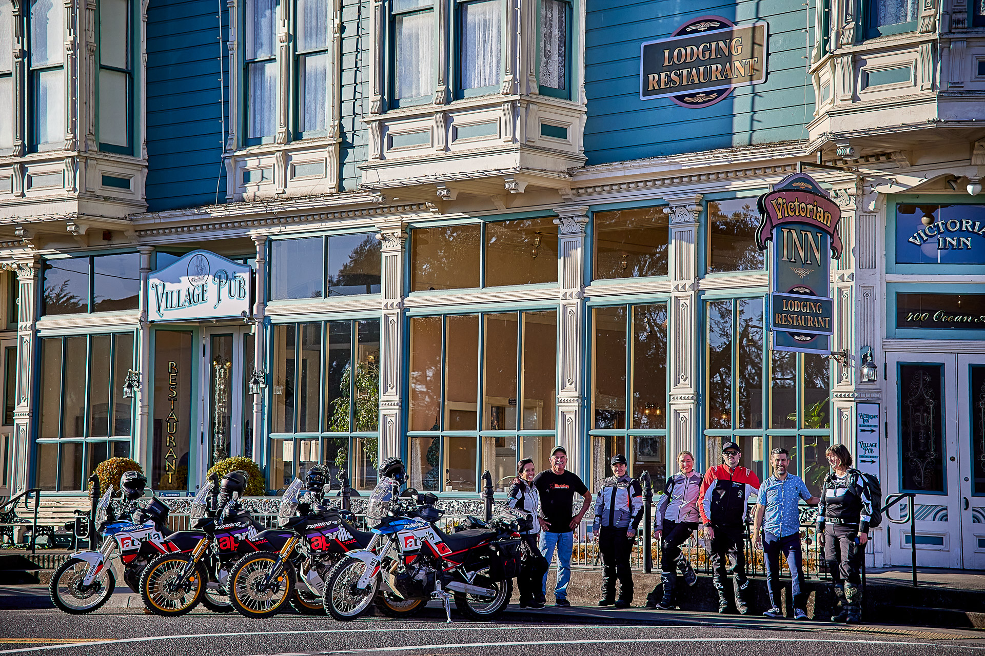 BMW R1250GS parked at a high-altitude fire lookout on an epic motorcycle travel route.