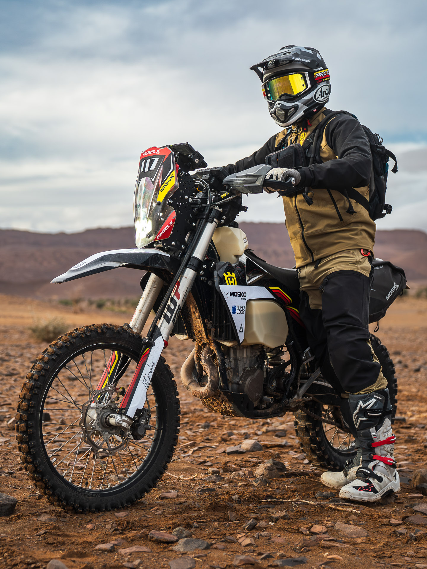 BMW R1250GS parked at a high-altitude fire lookout on an epic motorcycle travel route.